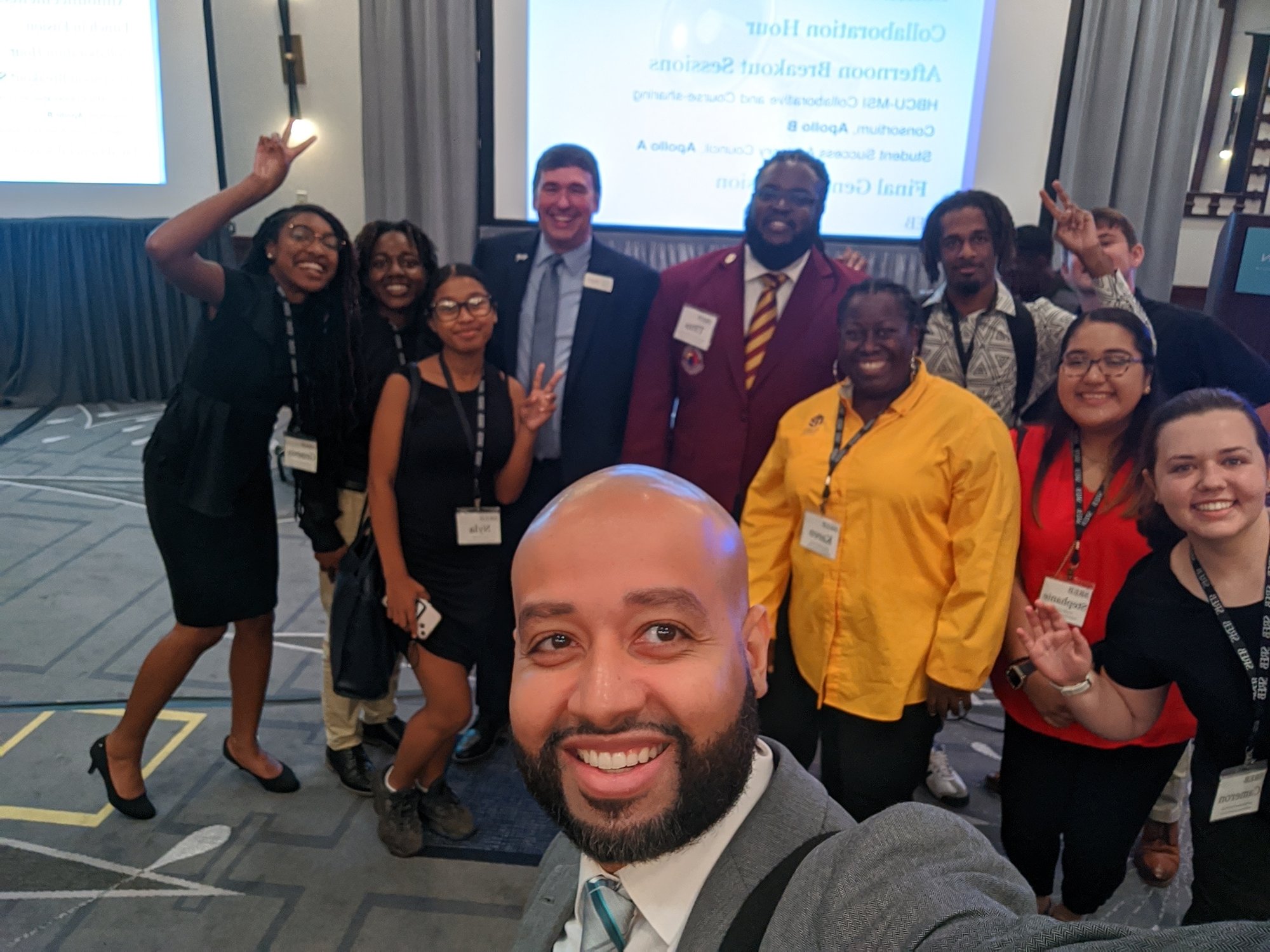 Dr. Stephen Pruitt and Dr. DeJesus selfie with students
