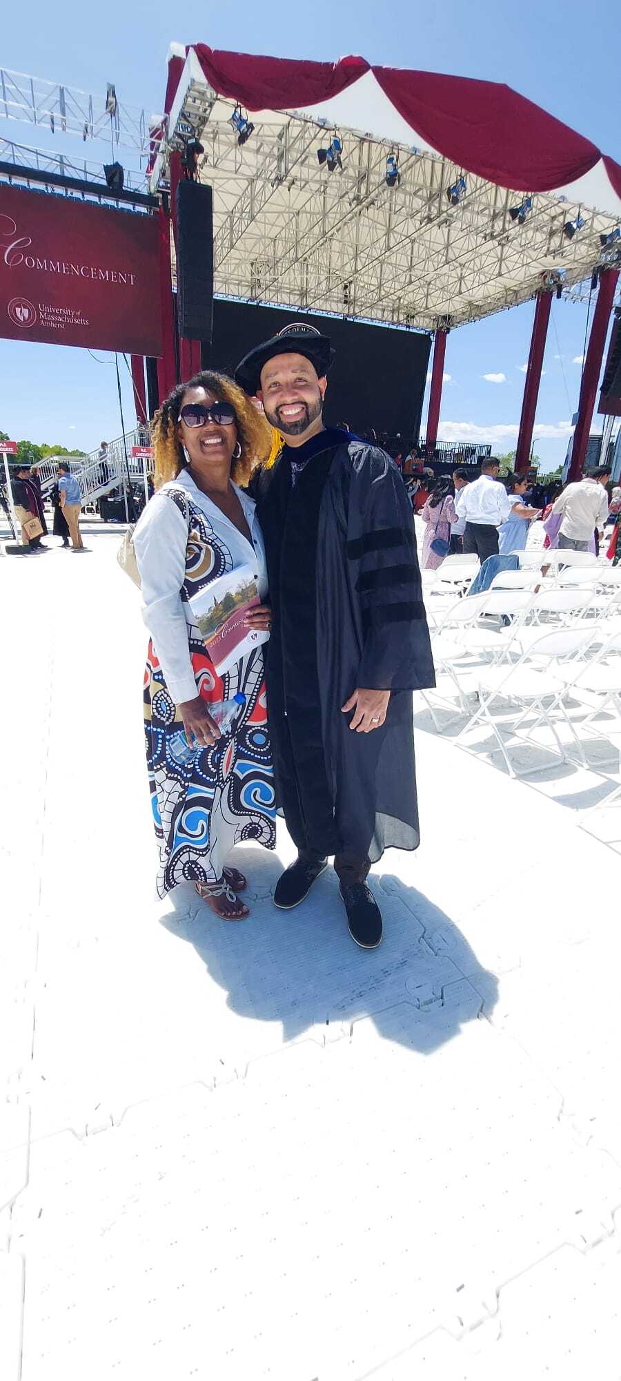 Cap and Gown Couple Commencement Stage